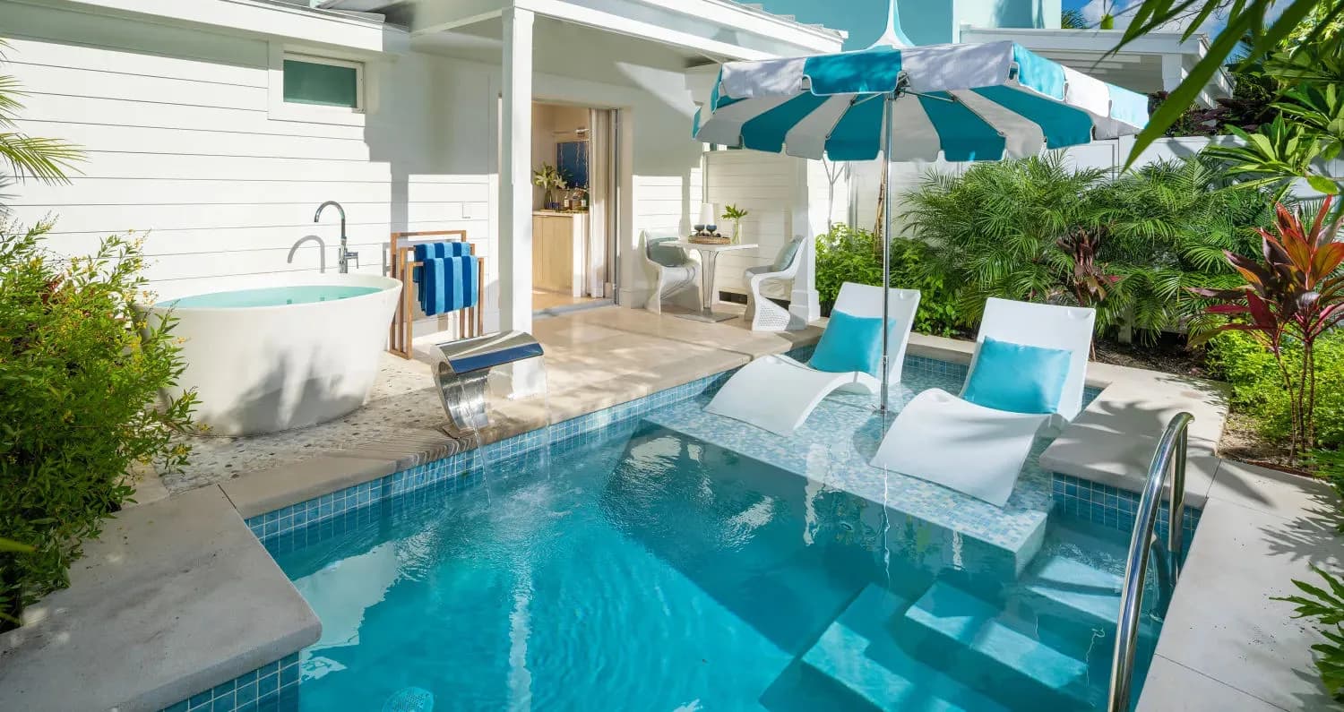 Suite with private pool and lounge chairs Suite with private pool and lounge chairs