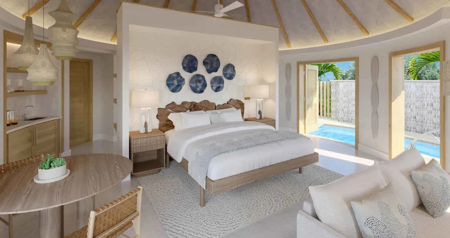Large bed with pool outside in the Rondoval Villa Large bed with pool outside in the Rondoval Villa
