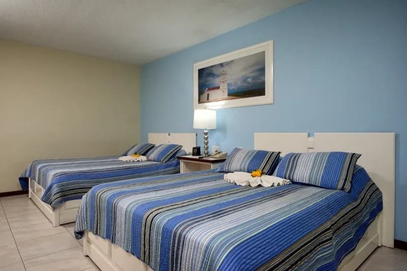 Two queen beds in a Deluxe Ocean View Room at Captain Don's Habitat in Bonaire Two queen beds in a Deluxe Ocean View Room at Captain Don's Habitat in Bonaire
